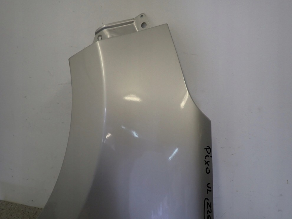 NISSAN PIXO 09- BŁOTNIK PRZEDNI LEWY Z2S 10/14