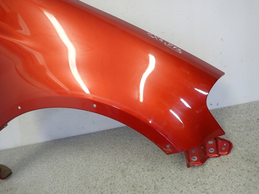 SUZUKI SX4 06-12 BŁOTNIK PRZEDNI PRAWY ZFS 3/10