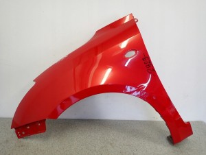SUZUKI SWIFT MK6 05-09 BŁOTNIK PRZEDNI LEWY ZCK