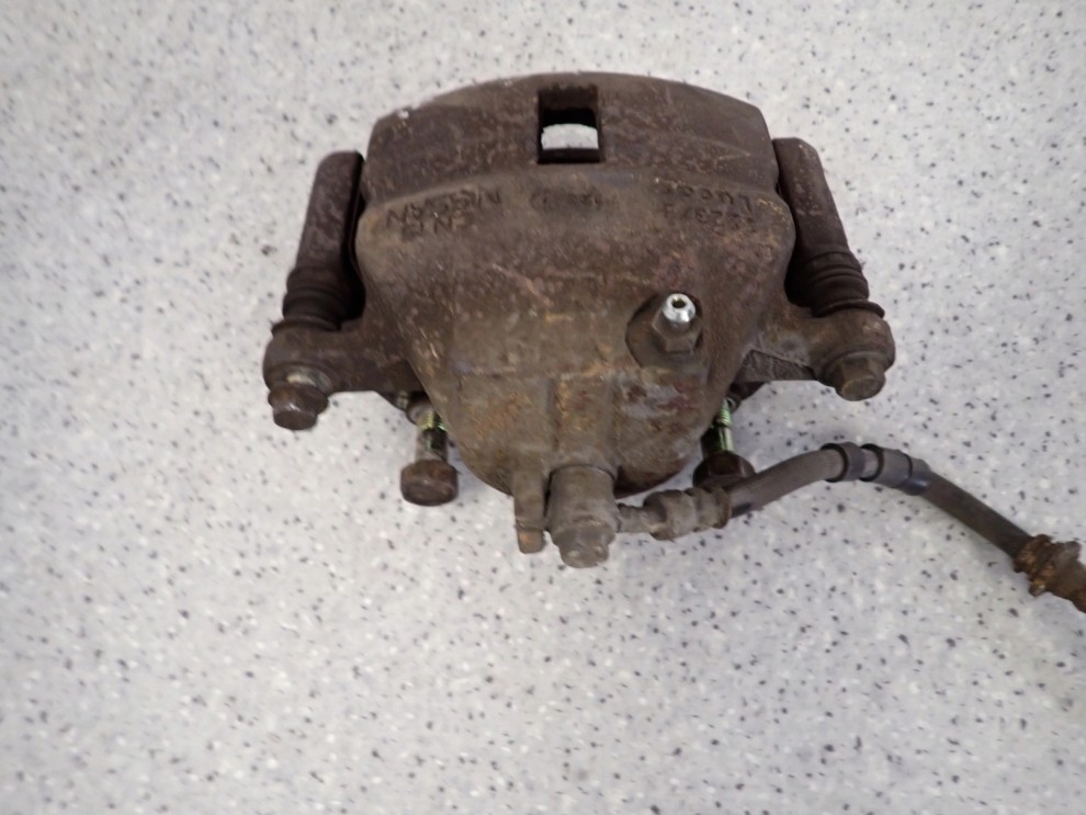 NISSAN PRIMERA P11 TD 97-01 ZACISK PRZEDNI PRAWY 5/7