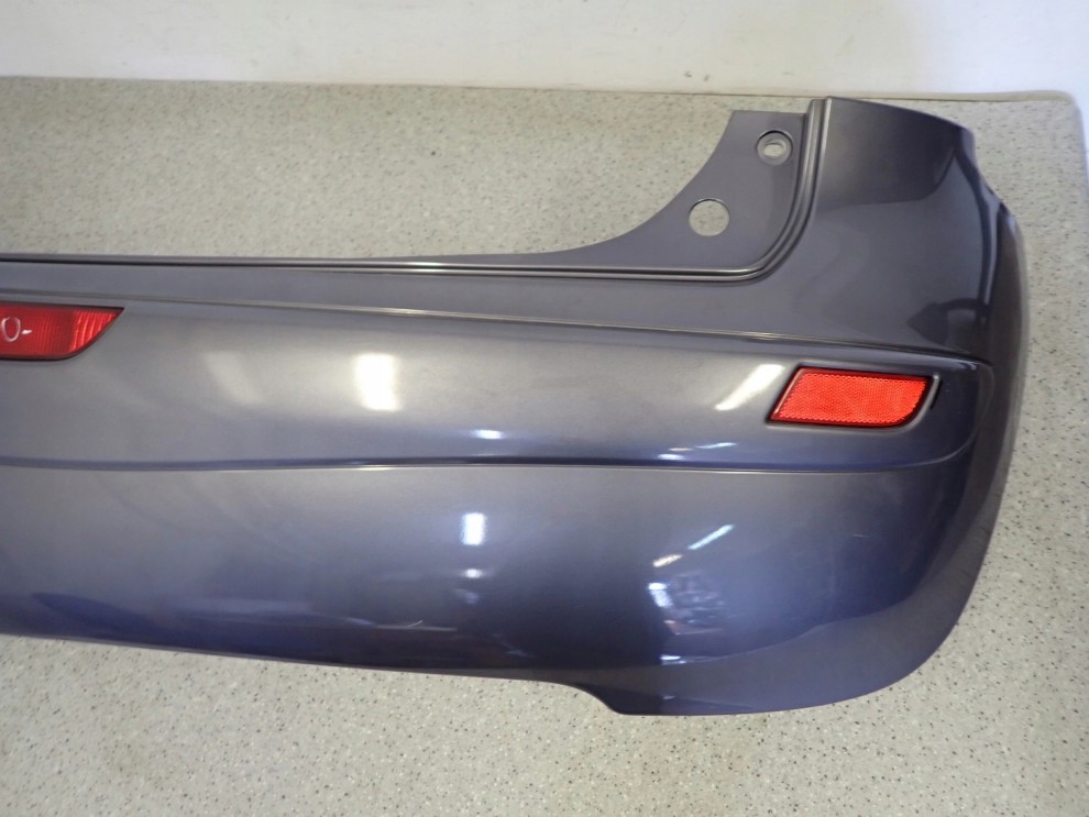 NISSAN NOTE E11 06-09 ZDERZAK TYLNY B52 7/13