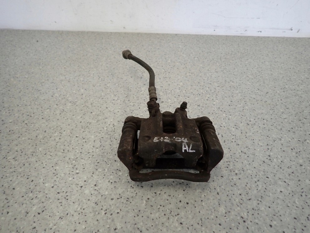 TOYOTA COROLLA E12 SB 02-07 ZACISK HAMULCOWY TYLNY LEWY 1/7