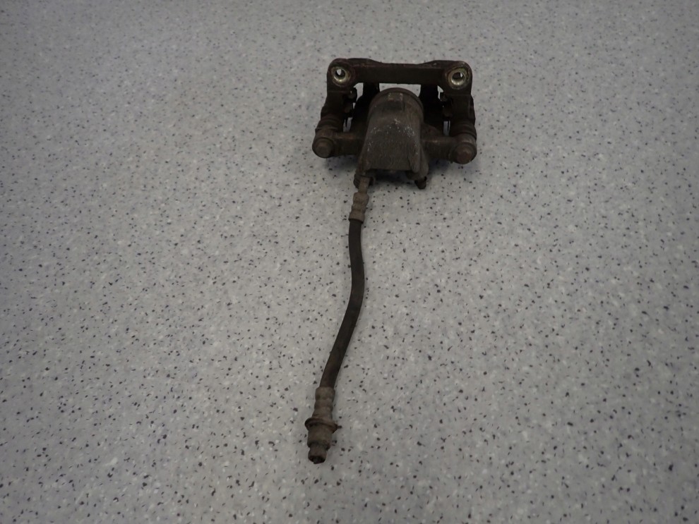 TOYOTA COROLLA E12 SB 02-07 ZACISK HAMULCOWY TYLNY LEWY 6/7