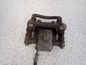 TOYOTA COROLLA E12 SB 02-07 ZACISK HAMULCOWY TYLNY LEWY 7/7 MINIATURA