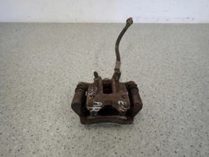 TOYOTA COROLLA E12 SB 02-07 ZACISK HAMULCOWY TYLNY PRAWY 1/6 MINIATURA