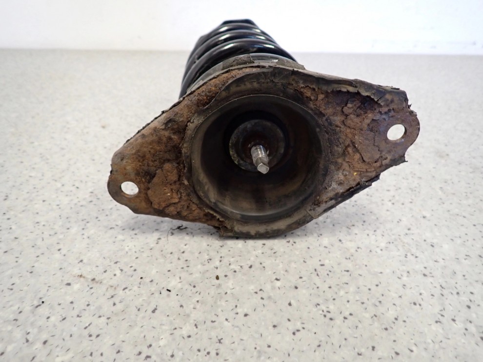 NISSAN ALMERA TINO AMORTYZATOR TYŁ 3/4