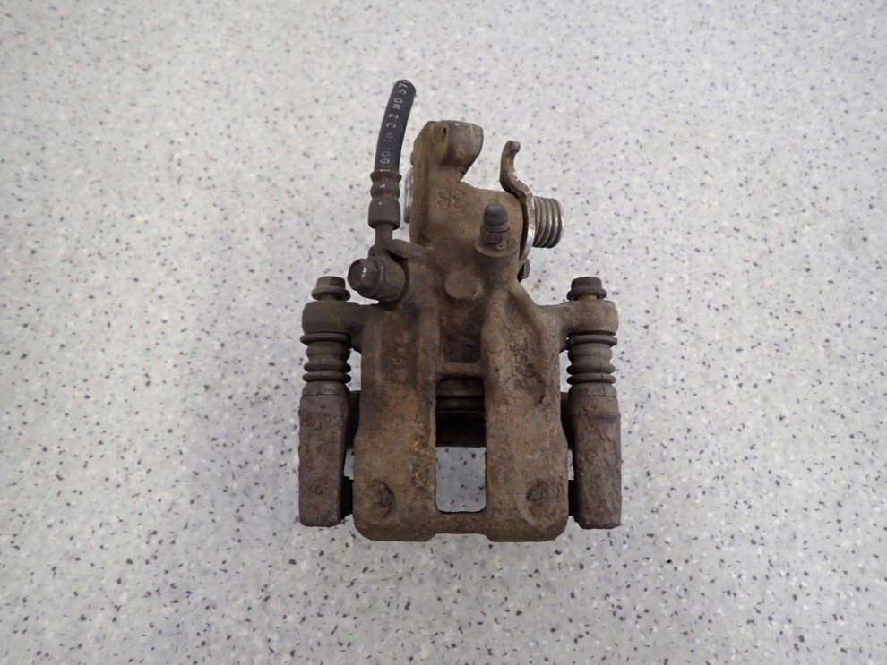 NISSAN ALMERA TINO 00-06 ZACISK HAMULCOWY TYLNY PRAWY 1/6