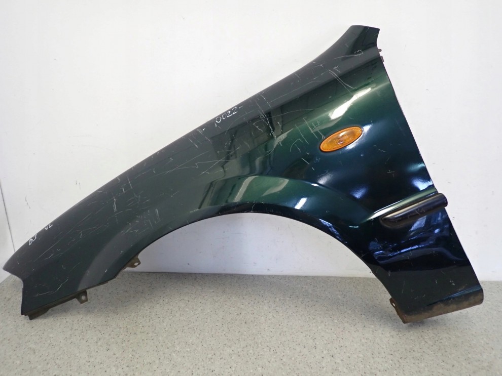 MAZDA 323 BJ F 98-00 BŁOTNIK PRZEDNI LEWY 1/10