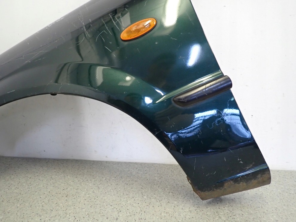 MAZDA 323 BJ F 98-00 BŁOTNIK PRZEDNI LEWY 4/10