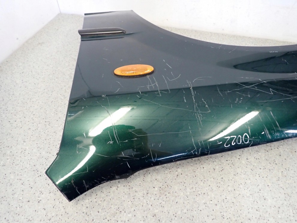 MAZDA 323 BJ F 98-00 BŁOTNIK PRZEDNI LEWY 7/10