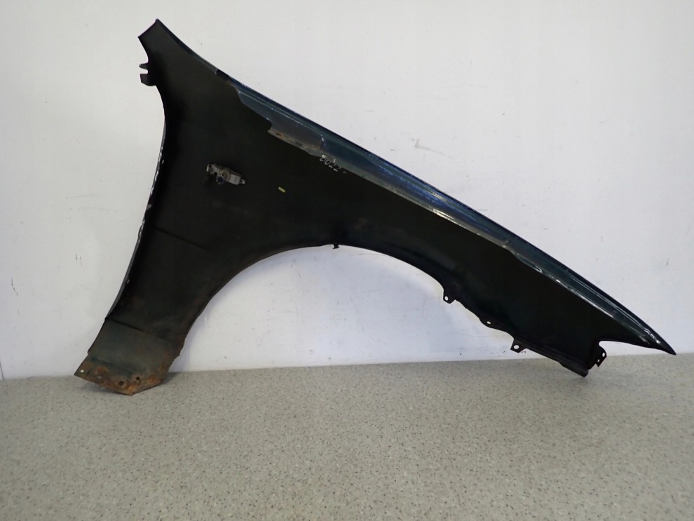 MAZDA 323 BJ F 98-00 BŁOTNIK PRZEDNI LEWY 9/10