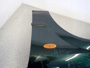 MAZDA 323 BJ F 98-00 BŁOTNIK PRZEDNI LEWY 8/10 MINIATURA