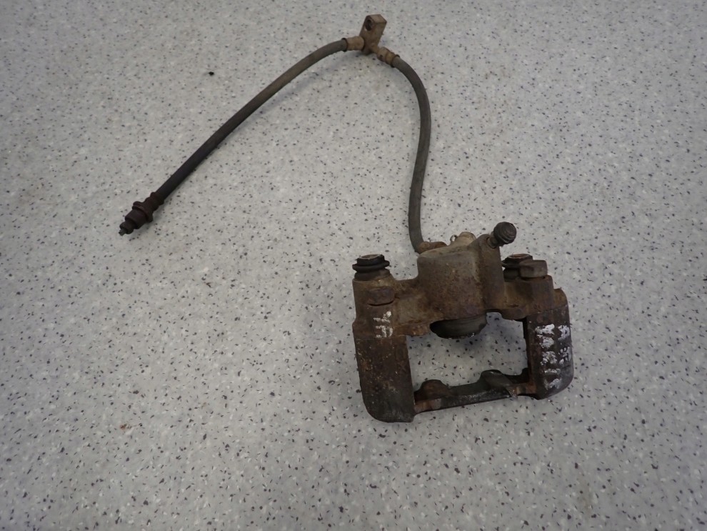 TOYOTA YARIS 99-05 ZACISK HAMULCOWY TYLNY PRAWY 1/6