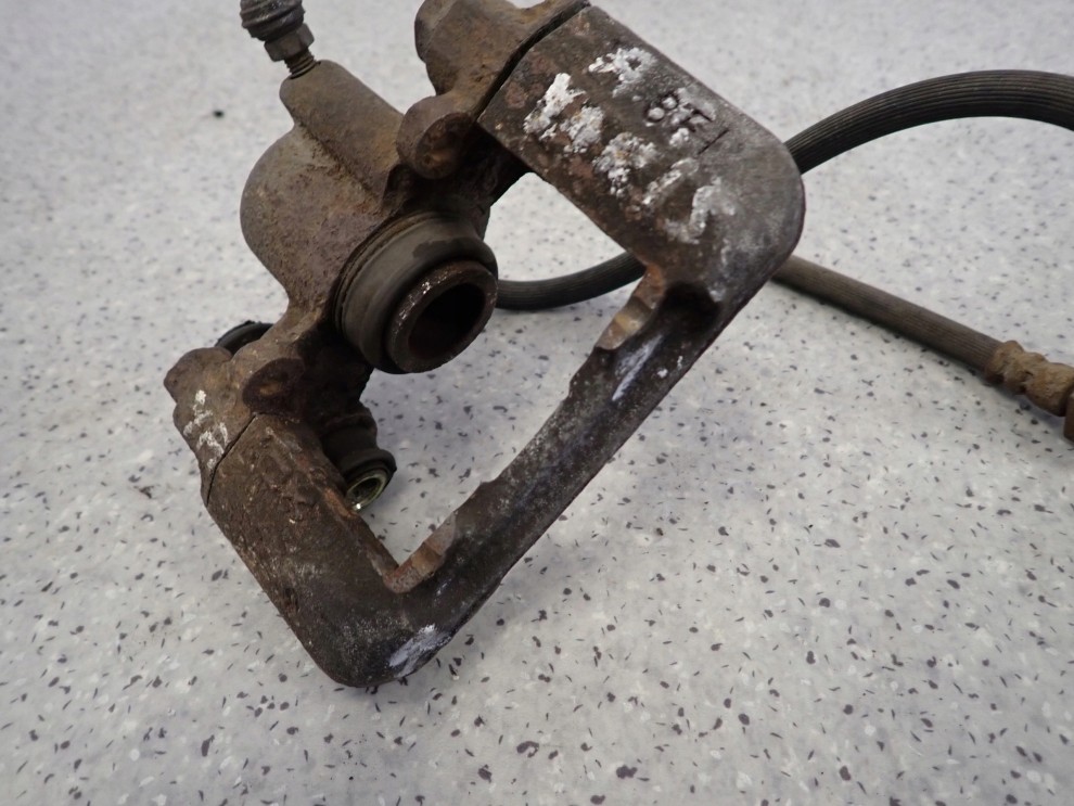 TOYOTA YARIS 99-05 ZACISK HAMULCOWY TYLNY PRAWY 5/6