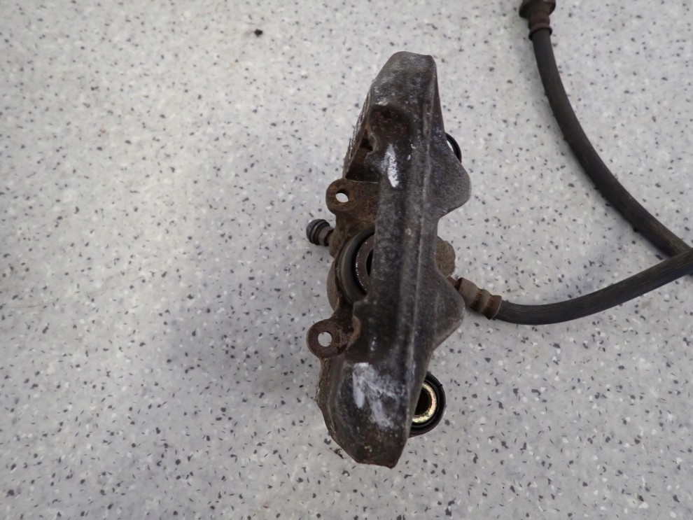 TOYOTA YARIS 99-05 ZACISK HAMULCOWY TYLNY PRAWY 6/6