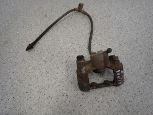 TOYOTA YARIS 99-05 ZACISK HAMULCOWY TYLNY PRAWY