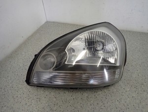 HYUNDAI TUCSON 04-10 REFLEKTOR LEWY LAMPA PRZEDNIA 1/8 MINIATURA