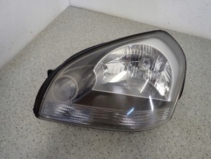 HYUNDAI TUCSON 04-10 REFLEKTOR LEWY LAMPA PRZEDNIA 2/8 MINIATURA