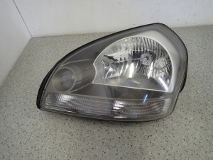 HYUNDAI TUCSON 04-10 REFLEKTOR LEWY LAMPA PRZEDNIA 4/8 MINIATURA