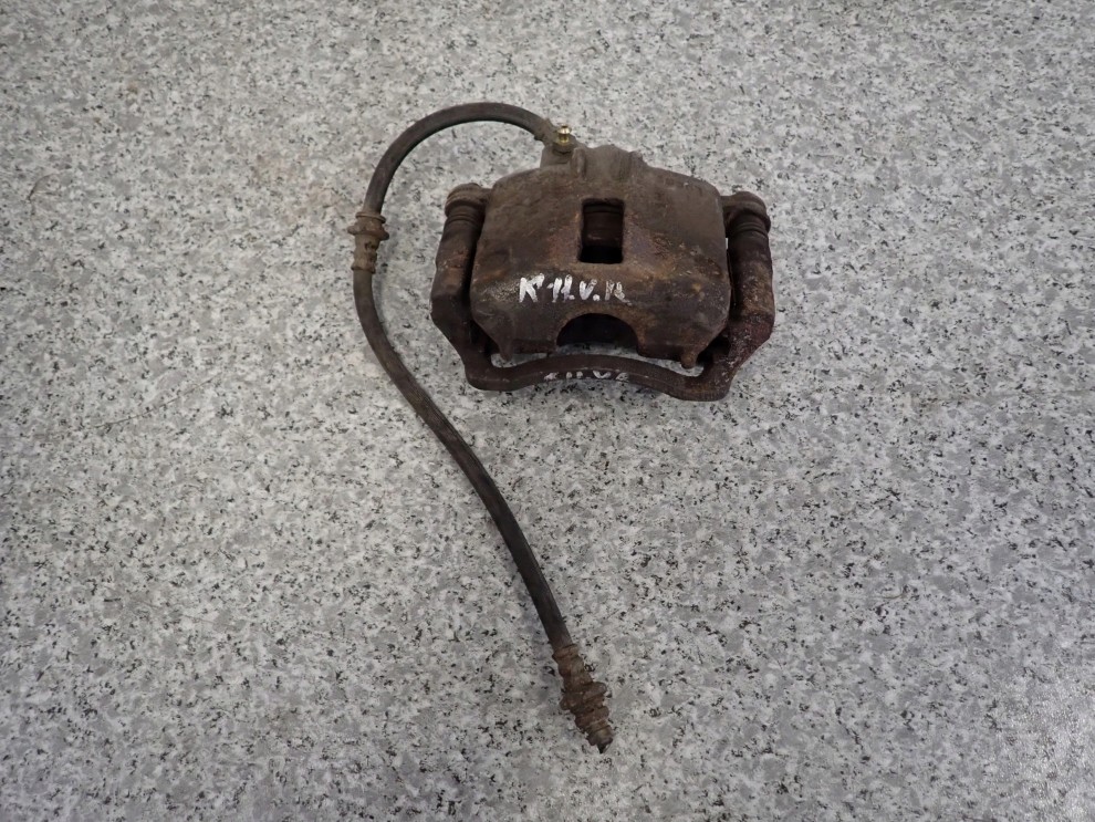 NISSAN MICRA K11 92-02 ZACISK HAMULCOWY PRZEDNI PRAWY 1/6