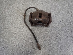 NISSAN MICRA K11 92-02 ZACISK HAMULCOWY PRZEDNI PRAWY