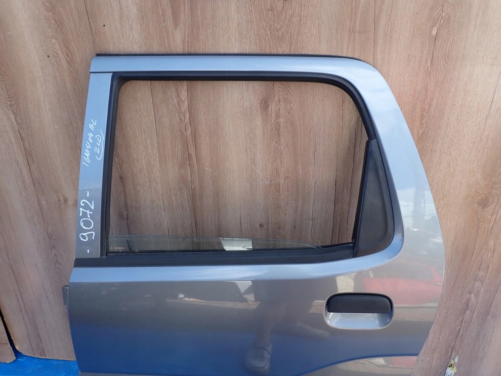 SUZUKI IGNIS 04-07 DRZWI TYLNE LEWE ZCD 7/9