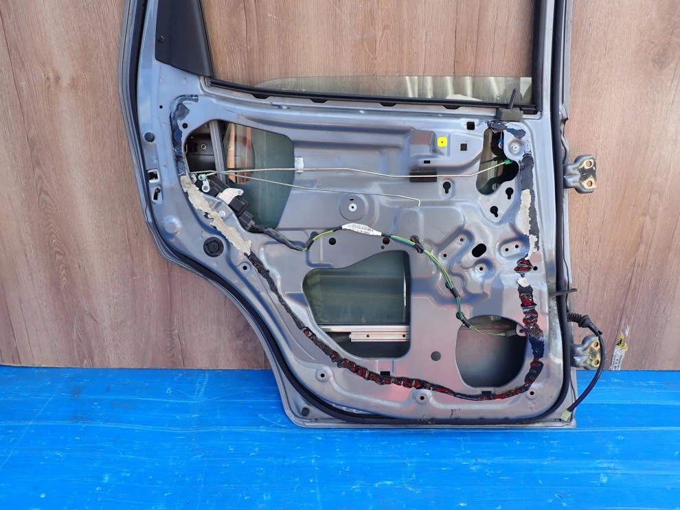 SUZUKI IGNIS 04-07 DRZWI TYLNE LEWE ZCD 9/9