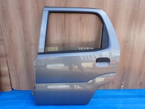 SUZUKI IGNIS 04-07 DRZWI TYLNE LEWE ZCD