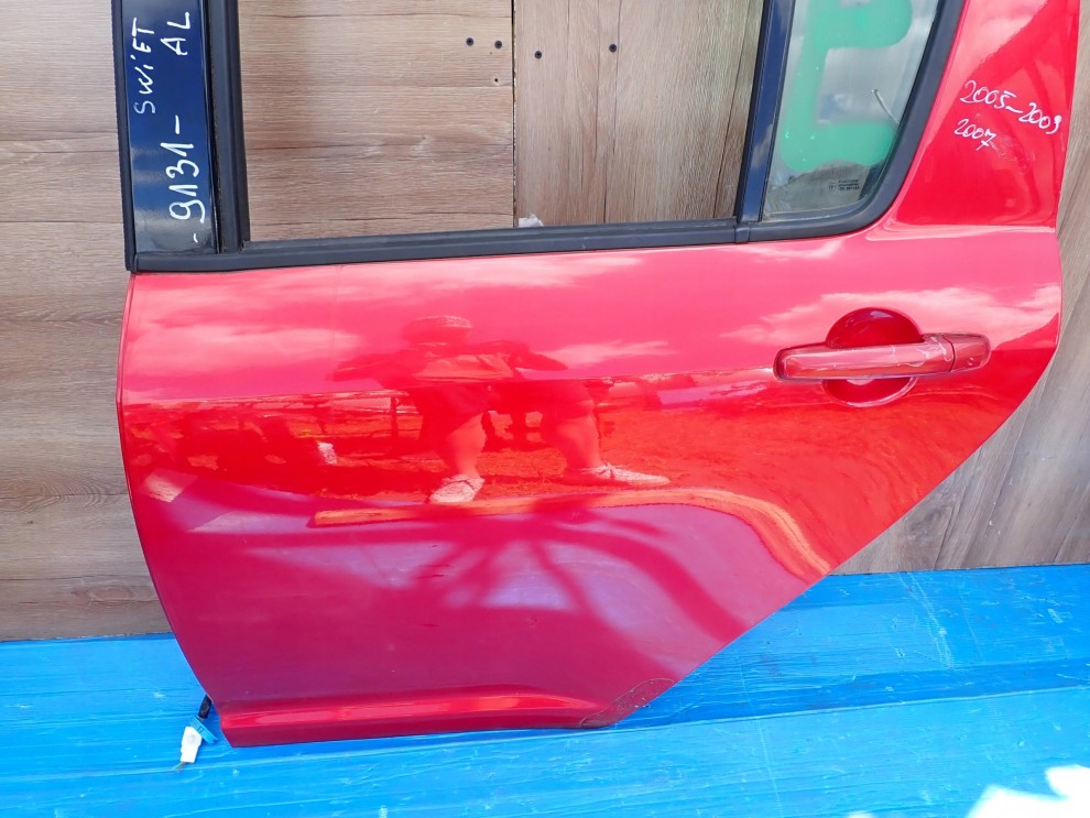 SUZUKI SWIFT 5d MK6 04-09 DRZWI TYLNE LEWE ZCK 2/10