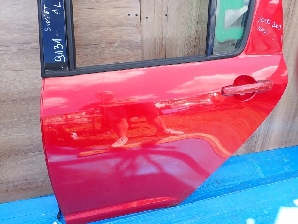 SUZUKI SWIFT 5d MK6 04-09 DRZWI TYLNE LEWE ZCK 4/10