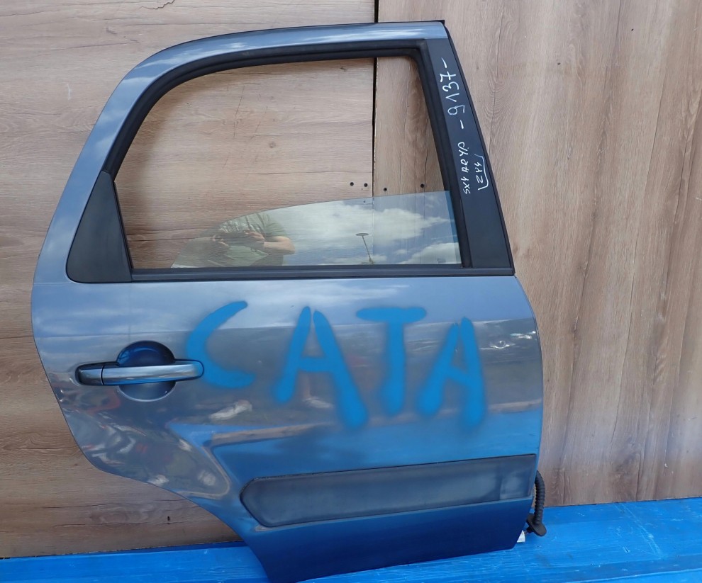 SUZUKI SX4 06-12 DRZWI TYLNE PRAWE ZY4 1/8