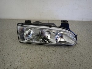 HYUNDAI SONATA I 91-93 REFLEKTOR PRAWY LAMPA PRZEDNIA PRAWA 1/8 MINIATURA