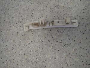 NISSAN NOTE E11 06-12 ŚLIZG ZDERZAKA PRZEDNI LEWY 6/7 MINIATURA