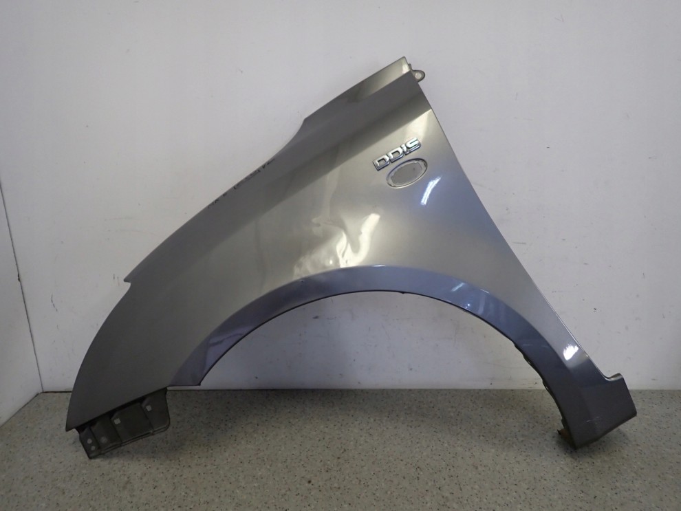 SUZUKI SWIFT MK6 05-09 BŁOTNIK PRZEDNI LEWY ZCD 1/12