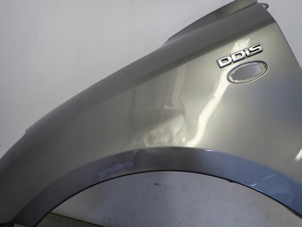 SUZUKI SWIFT MK6 05-09 BŁOTNIK PRZEDNI LEWY ZCD 5/12