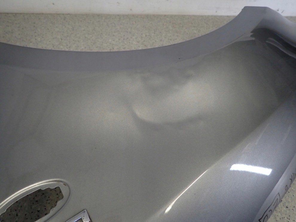 SUZUKI SWIFT MK6 05-09 BŁOTNIK PRZEDNI LEWY ZCD 8/12