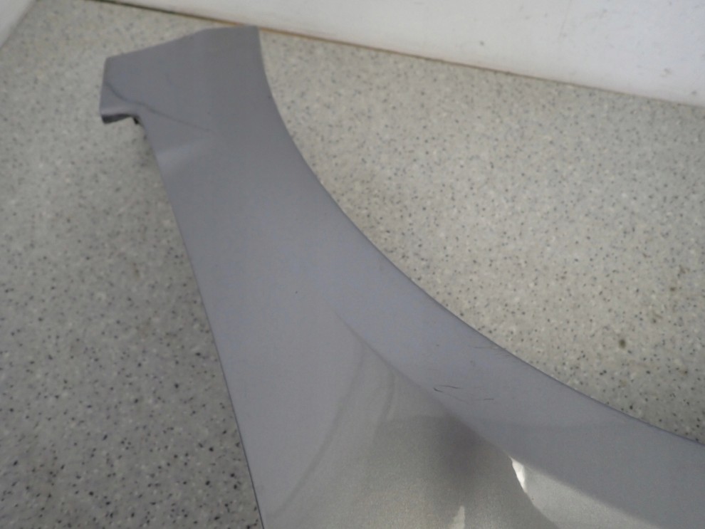 SUZUKI SWIFT MK6 05-09 BŁOTNIK PRZEDNI LEWY ZCD 10/12