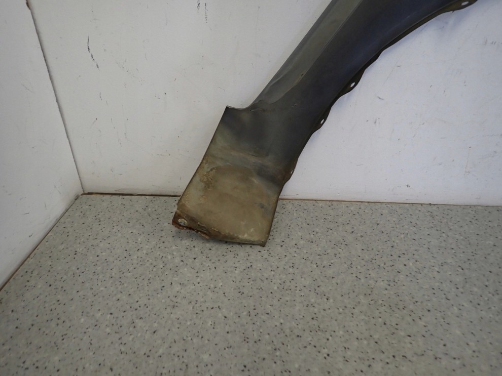 SUZUKI SWIFT MK6 05-09 BŁOTNIK PRZEDNI LEWY ZCD 12/12