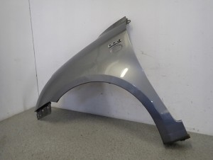 SUZUKI SWIFT MK6 05-09 BŁOTNIK PRZEDNI LEWY ZCD 3/12 MINIATURA