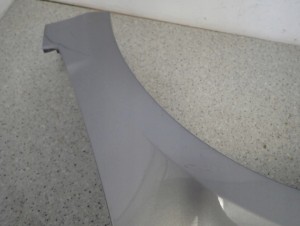 SUZUKI SWIFT MK6 05-09 BŁOTNIK PRZEDNI LEWY ZCD 10/12 MINIATURA