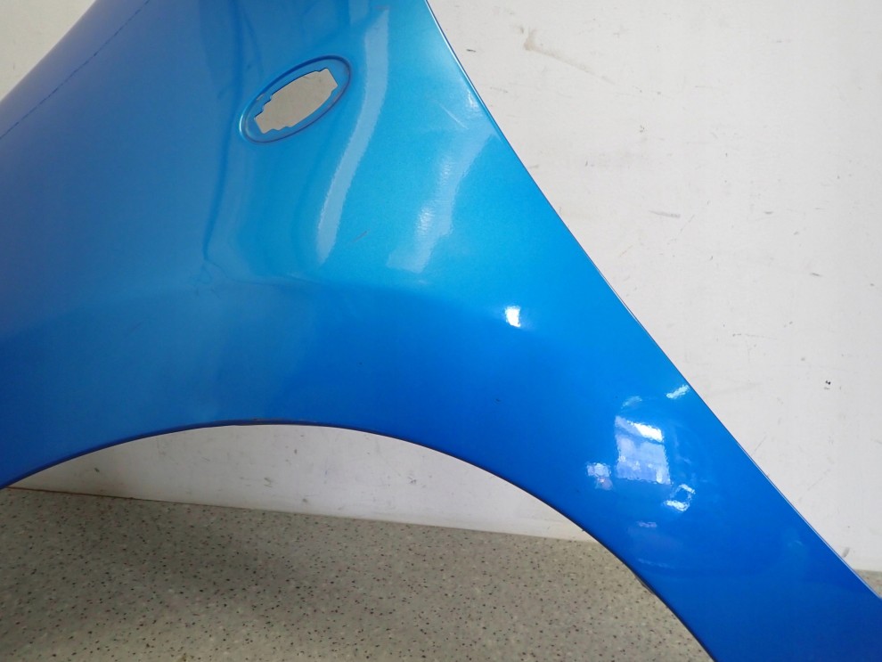 SUZUKI ALTO 5d 09-14 BŁOTNIK PRZEDNI LEWY ZKY 8/11