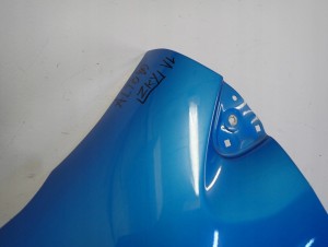 SUZUKI ALTO 5d 09-14 BŁOTNIK PRZEDNI LEWY ZKY 7/11 MINIATURA