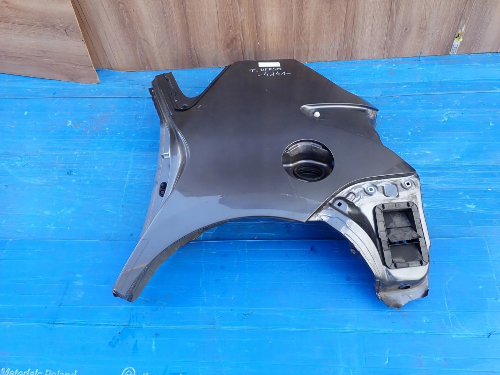 TOYOTA VERSO 09- BŁOTNIK TYLNY LEWY 6/12