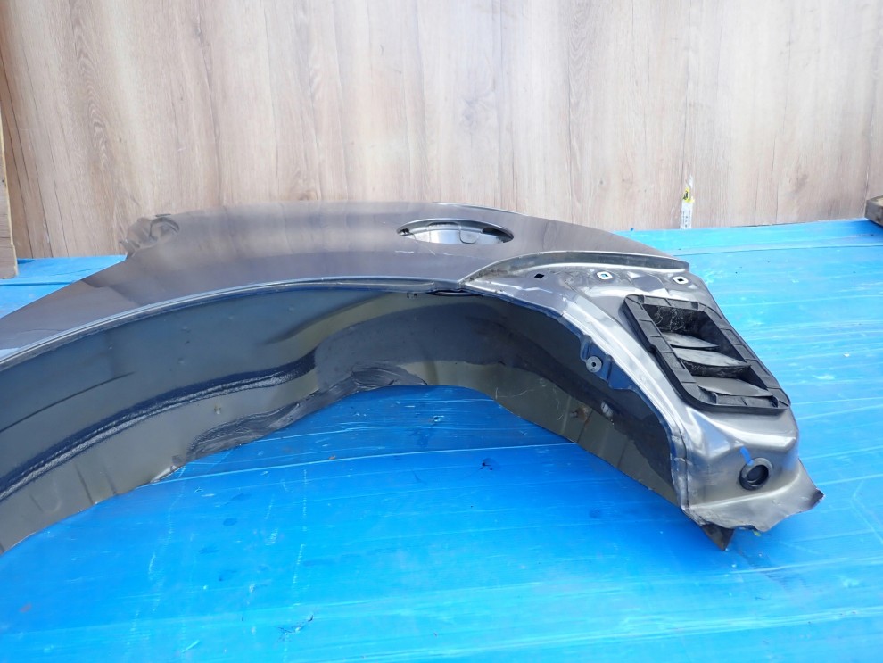 TOYOTA VERSO 09- BŁOTNIK TYLNY LEWY 9/12