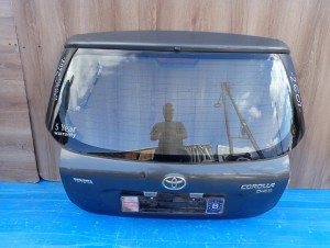 TOYOTA COROLLA E12 HB JP 02-07 KLAPA BAGAŻNIKA 1C3 1/7 MINIATURA