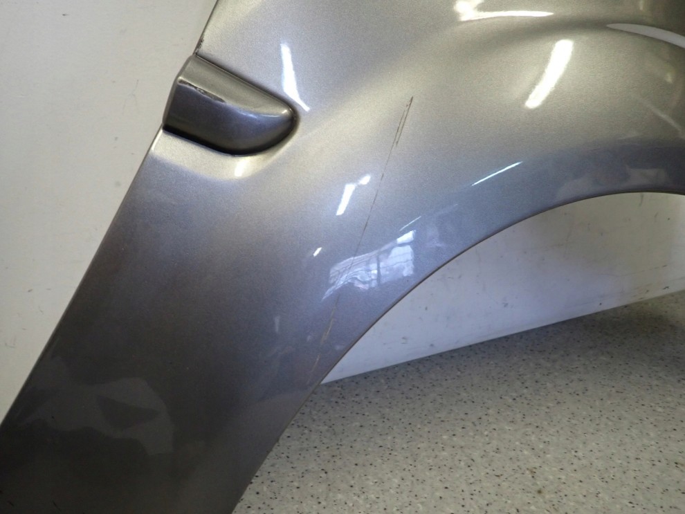 KIA RIO II 09-11 BŁOTNIK PRZEDNI PRAWY IM 8/13