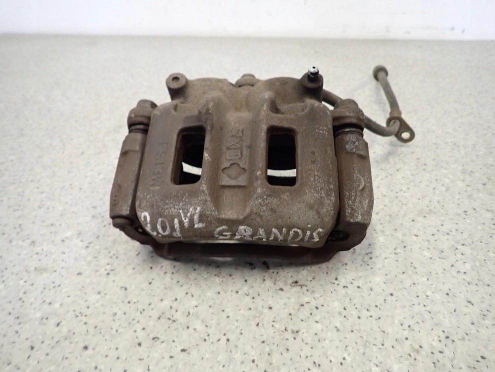 MITSUBISHI GRANDIS 03-11 ZACISK PRZEDNI LEWY 1/8