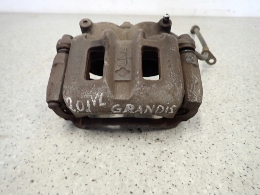 MITSUBISHI GRANDIS 03-11 ZACISK PRZEDNI LEWY 2/8