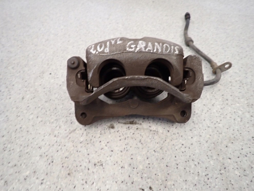 MITSUBISHI GRANDIS 03-11 ZACISK PRZEDNI LEWY 4/8