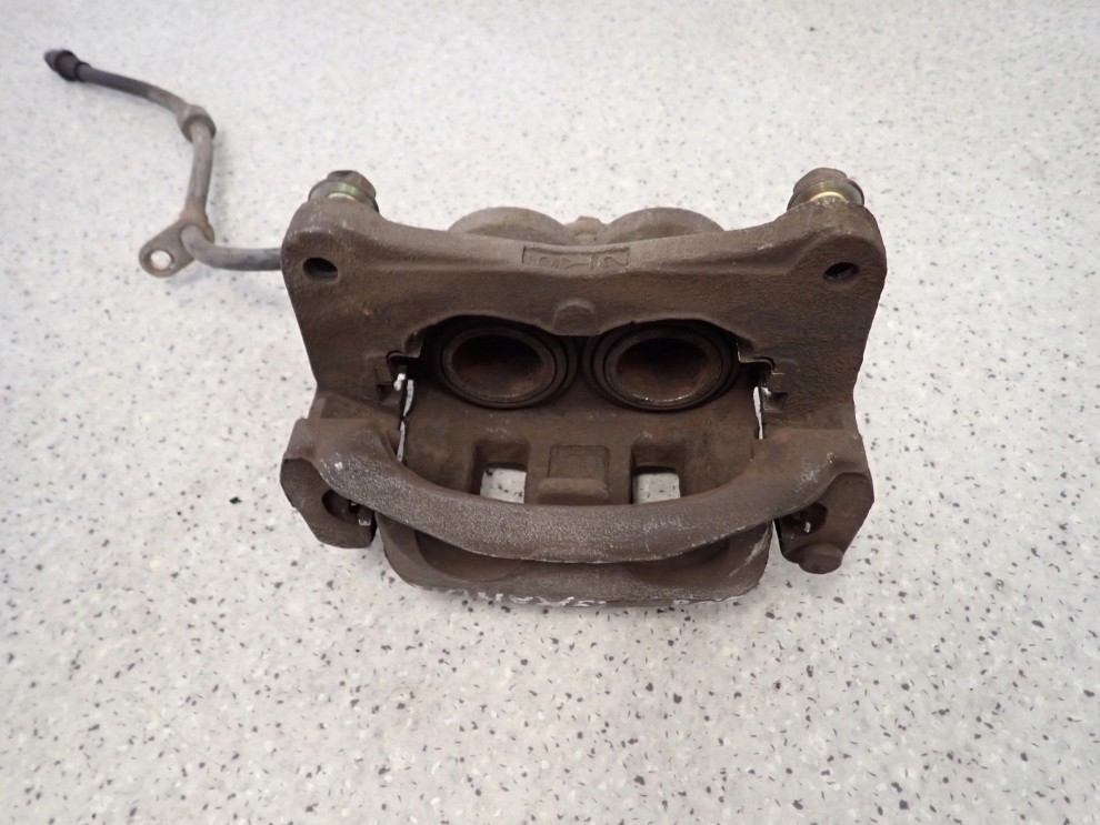 MITSUBISHI GRANDIS 03-11 ZACISK PRZEDNI LEWY 7/8